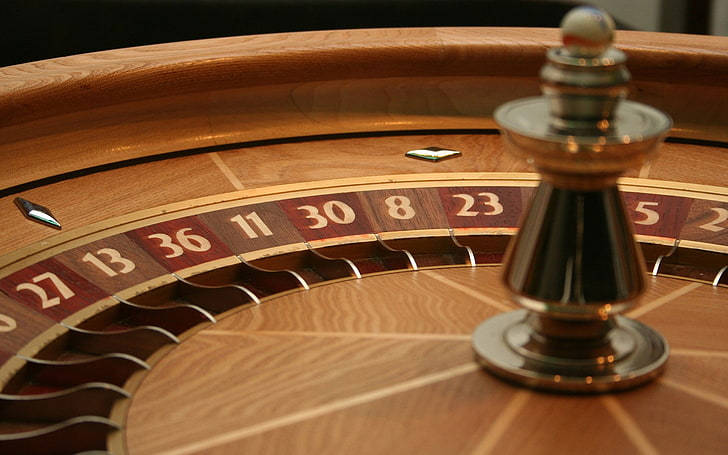 Dramatic View Of A Roulette Wheel Wallpaper