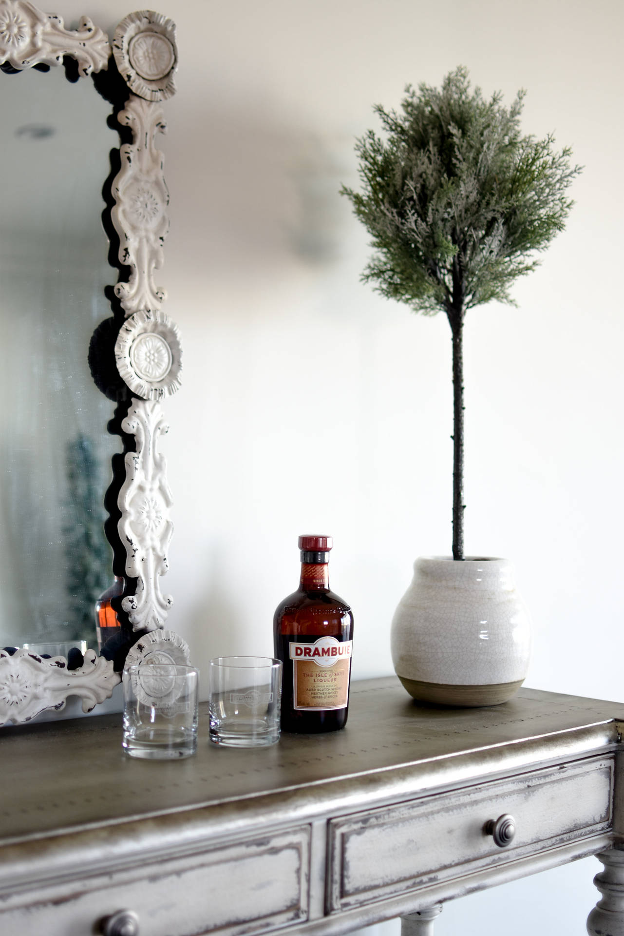 Luxurious Drambuie Scotch Whisky Displayed on Dressing Table Wallpaper