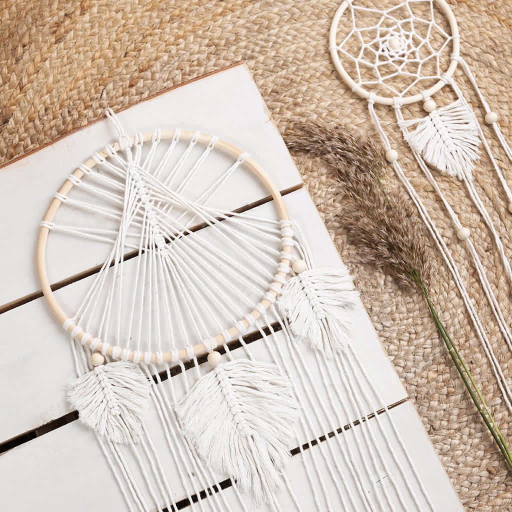 White Dream Catcher On A Wooden Table