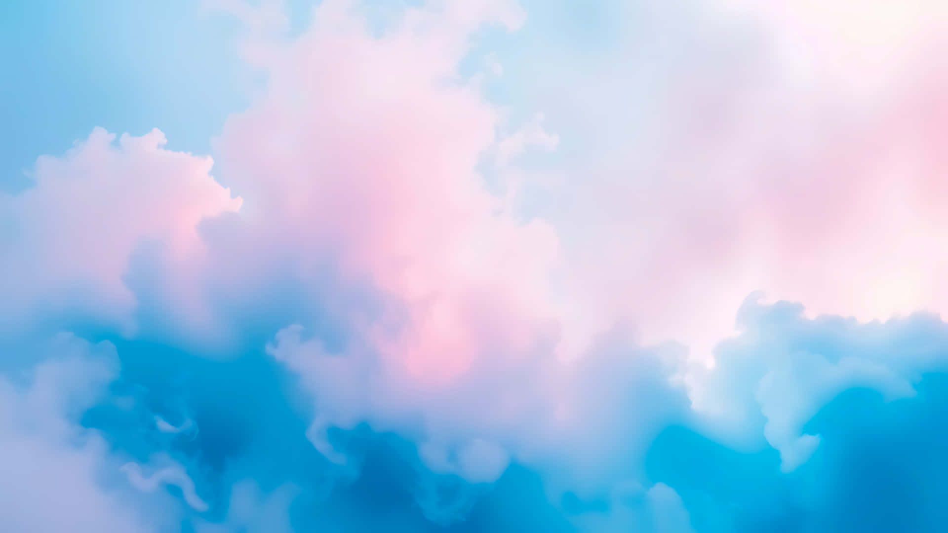 Dreamy Pink And Blue Clouds Creating A Soft And Ethereal Atmosphere Wallpaper