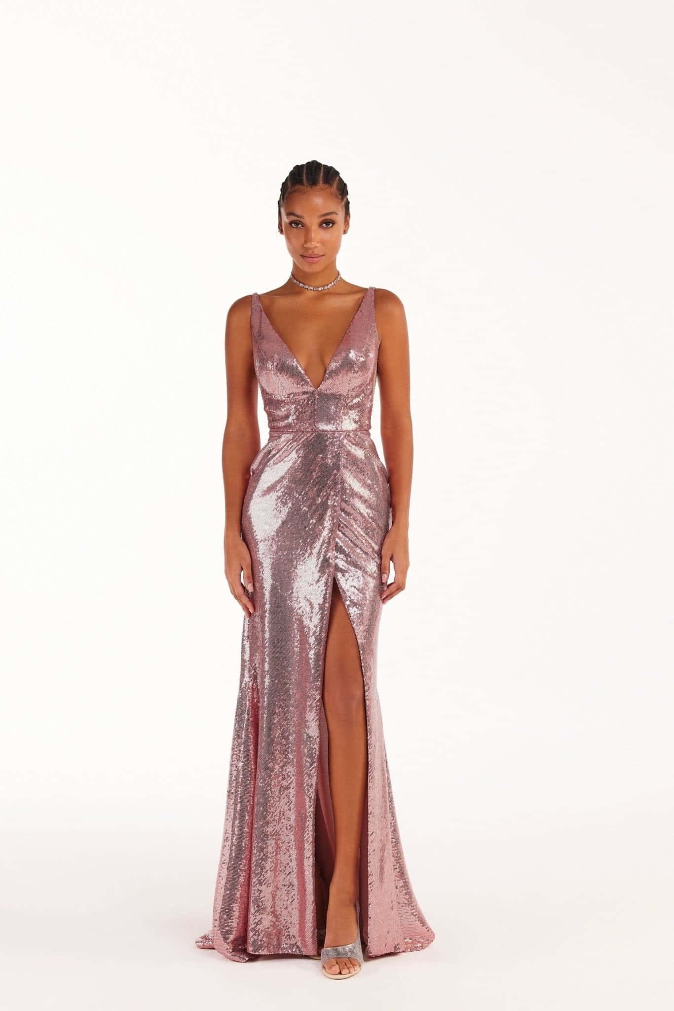 A Model Wearing A Pink Sequin Gown