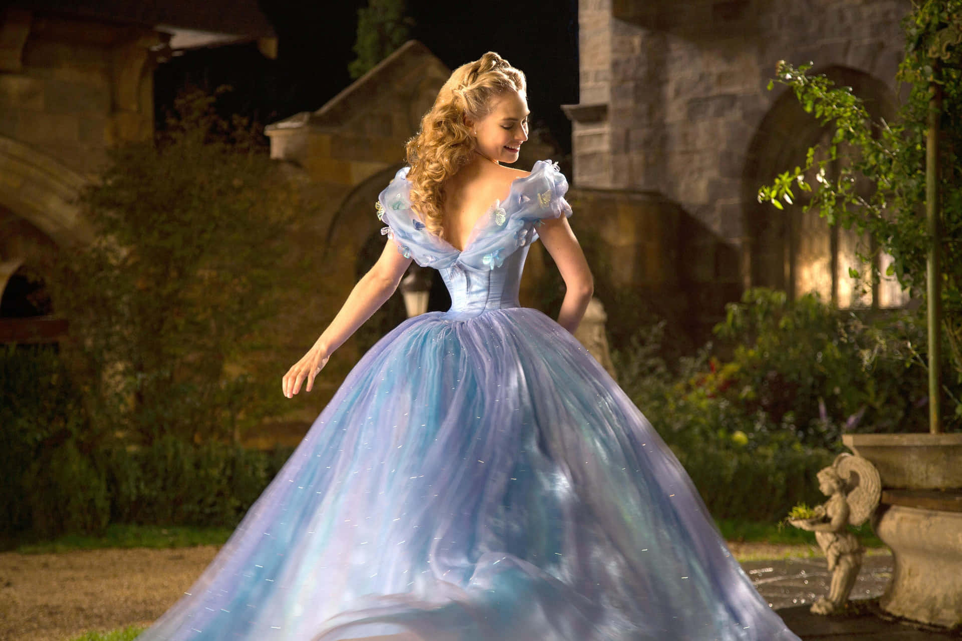 Cinderella In A Blue Dress Walking In A Courtyard