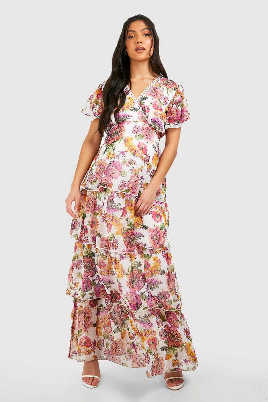 A Woman Wearing A Floral Print Maxi Dress