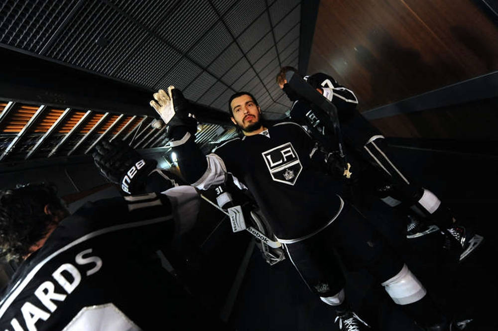 Drew Doughty Hands Up To High Five Teammate Mike Richards Wallpaper