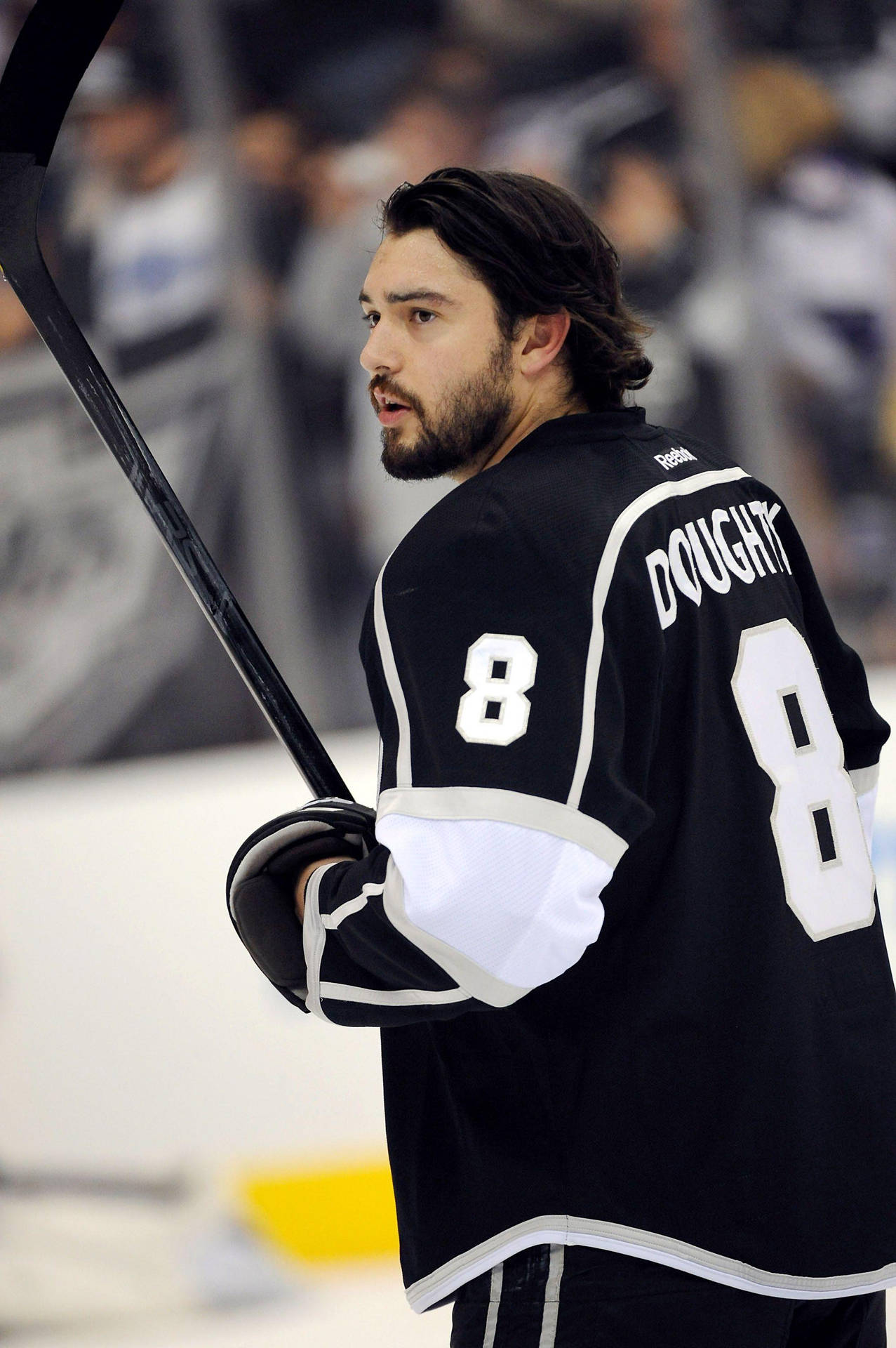 Drew Doughty - Focused on the game with hockey stick in hand. Wallpaper