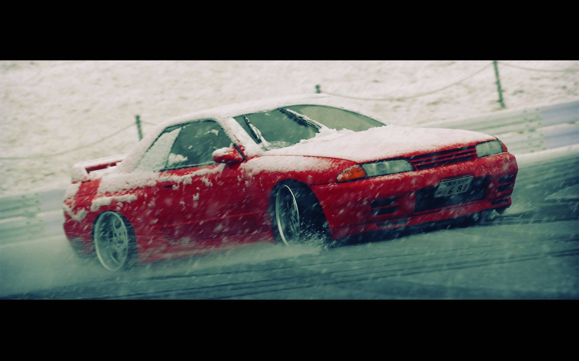 Drift Car Amidst Snow Wallpaper