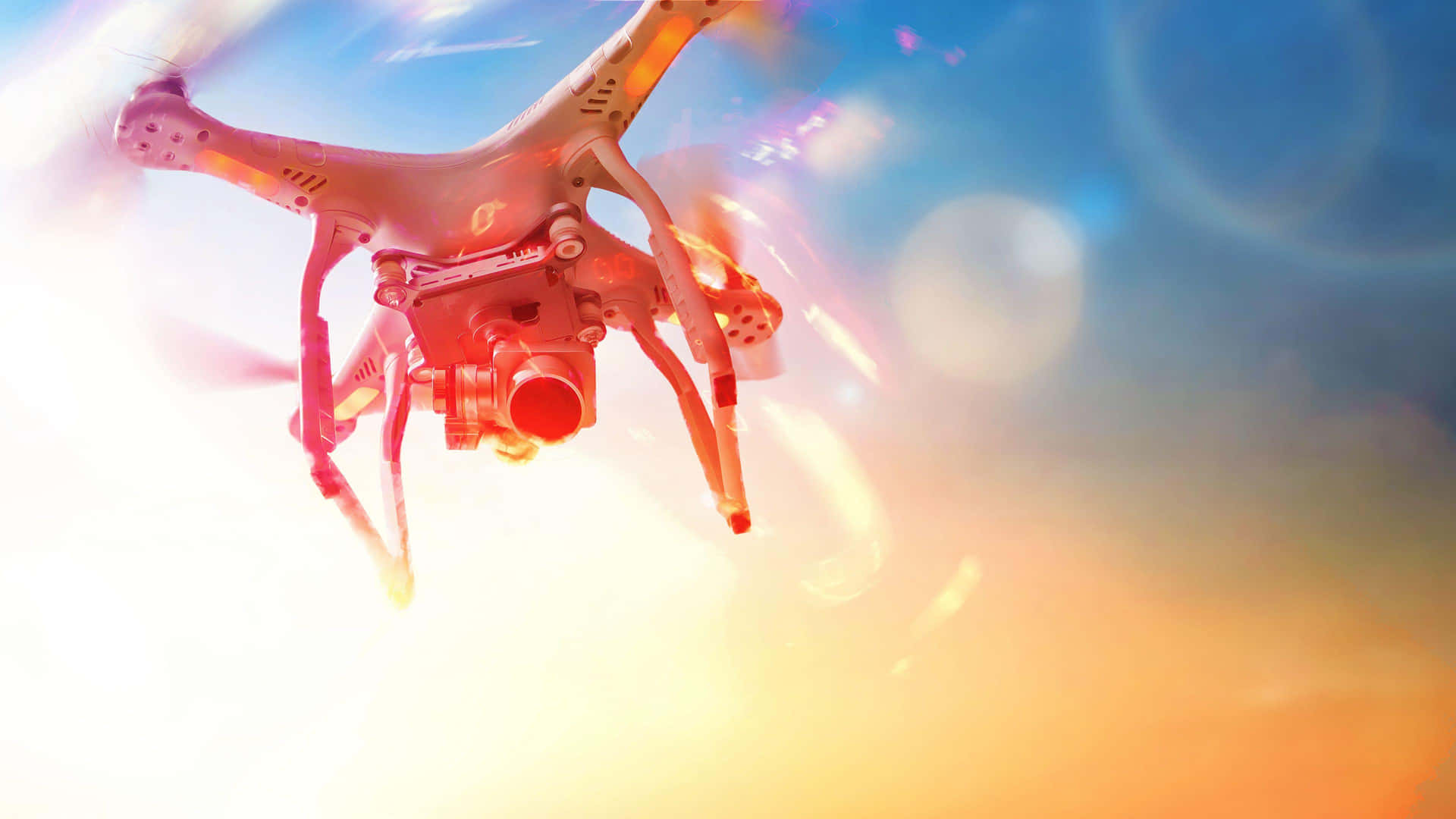 Drone In Flight Sunset Glow Wallpaper