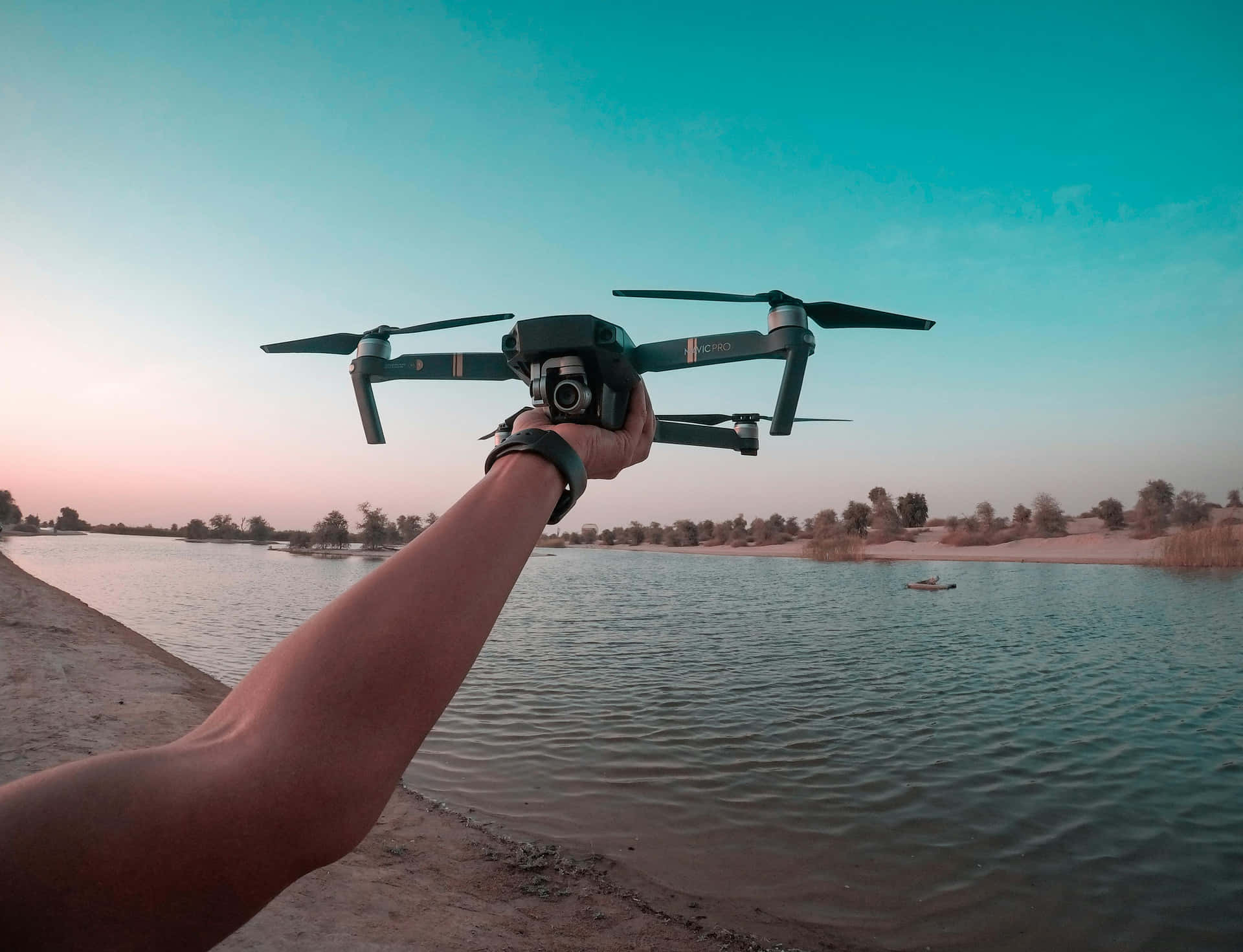 Drone Readyfor Flightat Lakeside Wallpaper