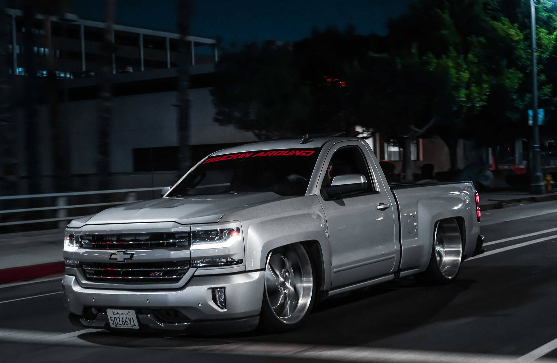 Dropped Truck At Night Wallpaper