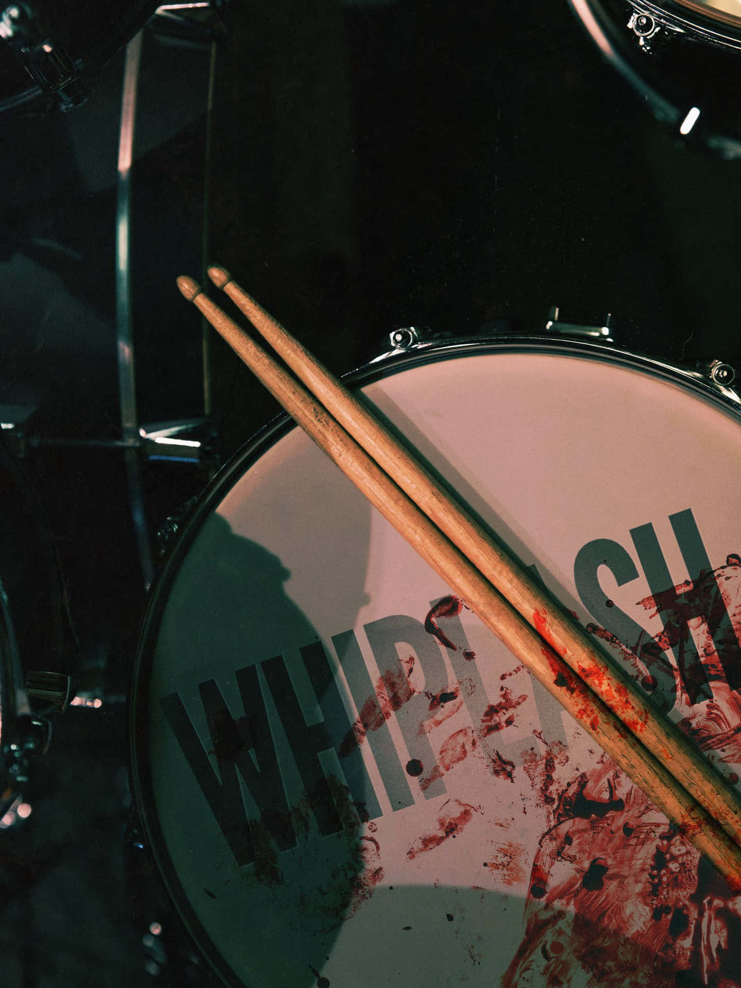 Drumset With Whiplash Logoand Sticks Wallpaper