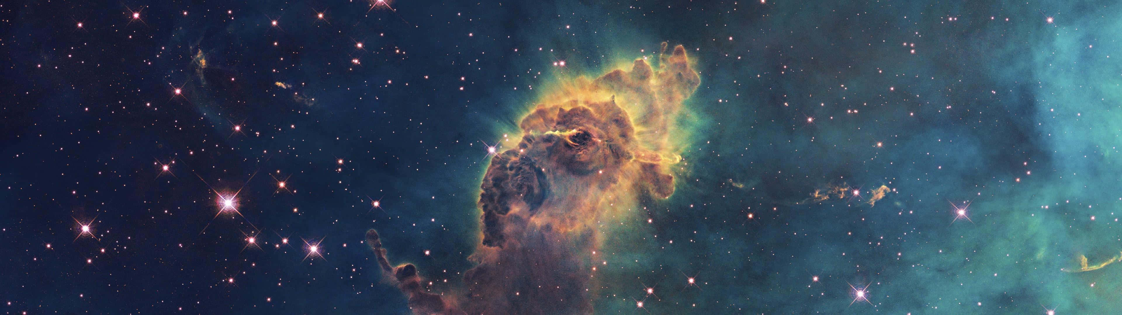 Enrymdscen Med En Nebulosa Och Stjärnor Wallpaper