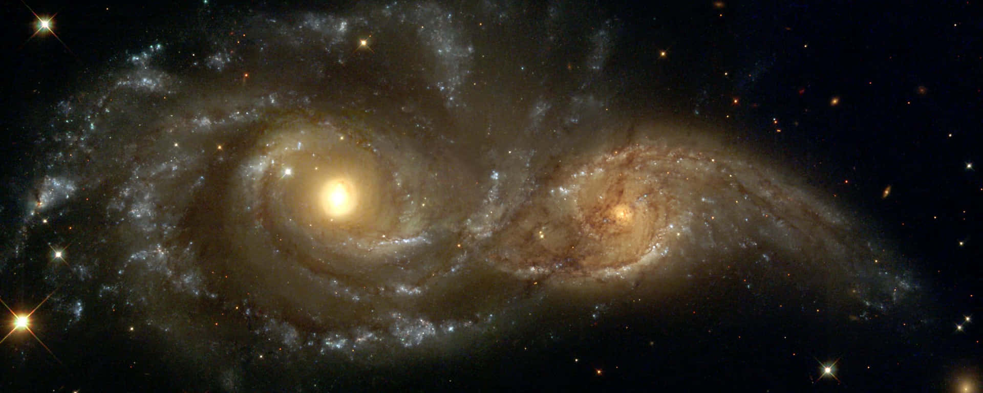 Dual Screen Space Two Spiral Galaxies Wallpaper