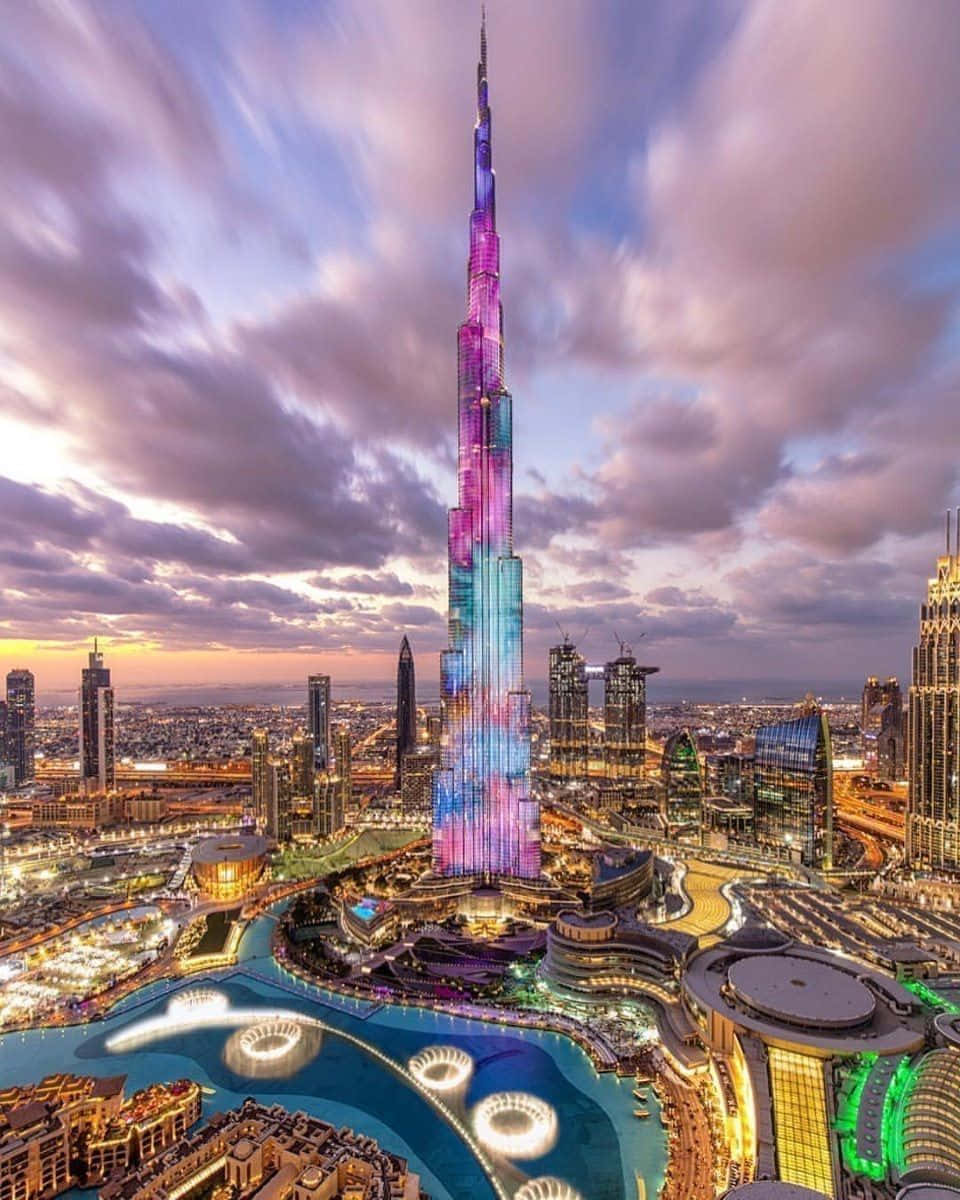 The Burj Khalifa Tower Is Lit Up At Dusk