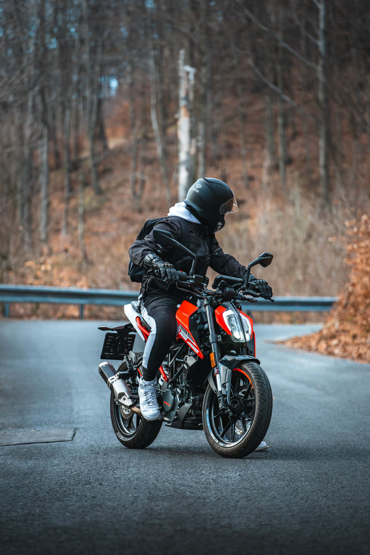 Man Riding Ktm Duke 390 Motorcycle Picture