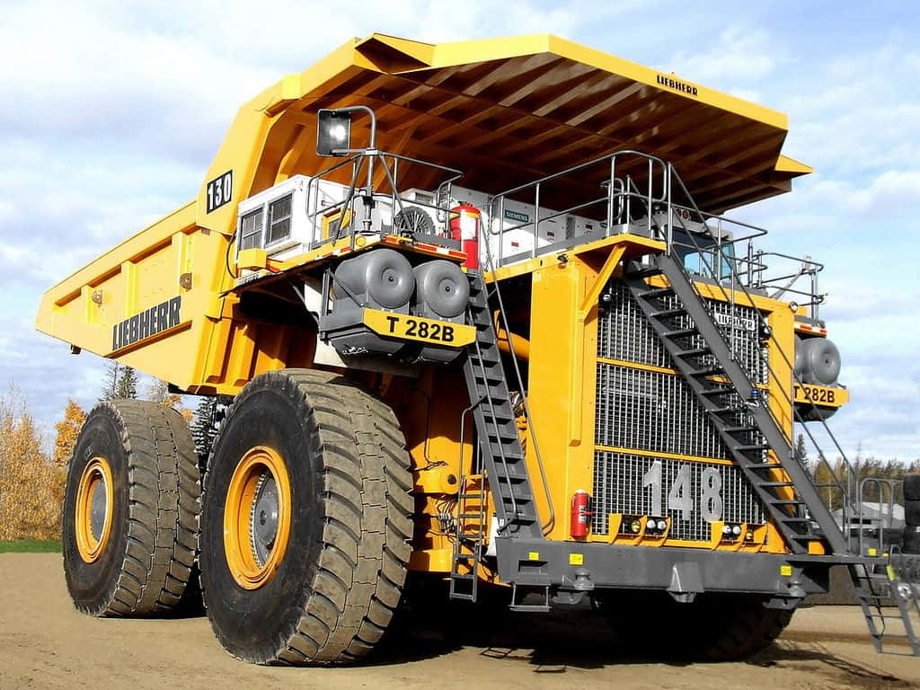 A Large Yellow Dump Truck