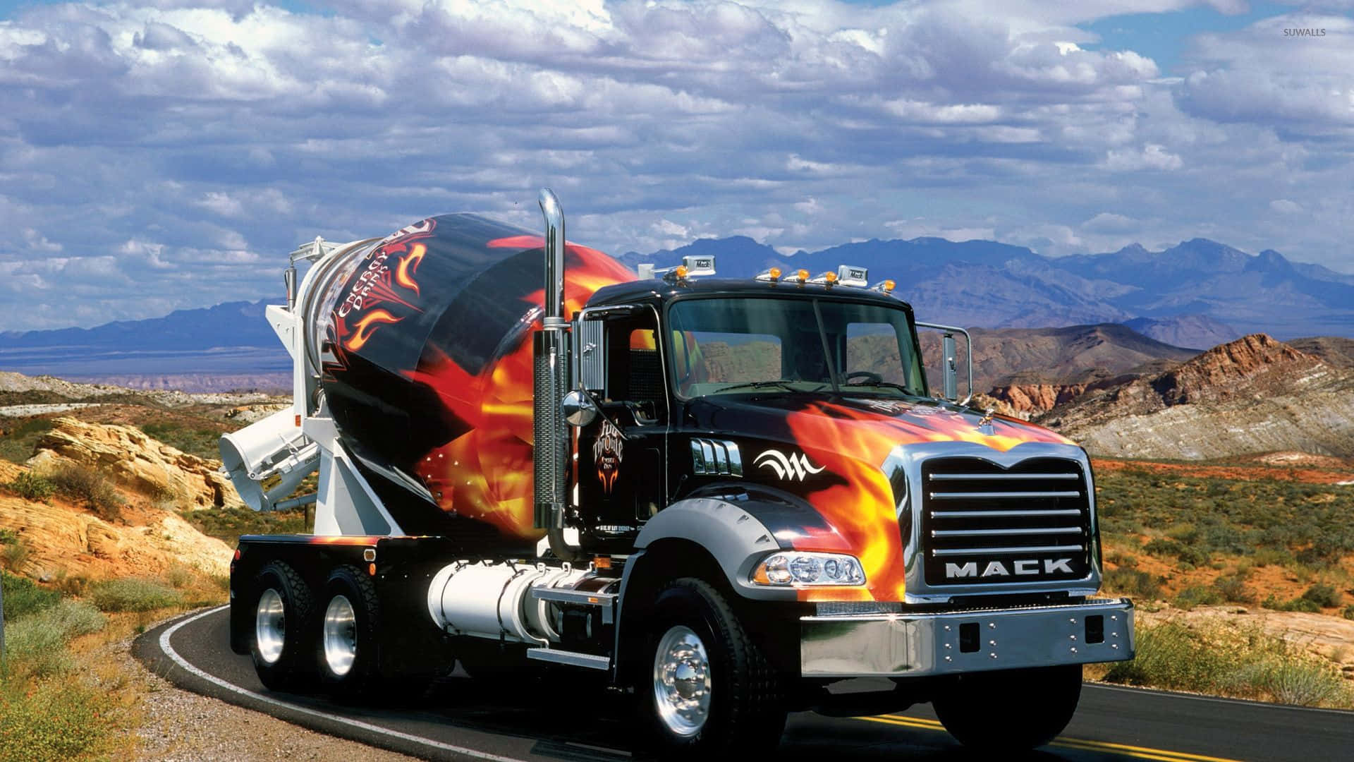 A Large Truck With A Flame On It