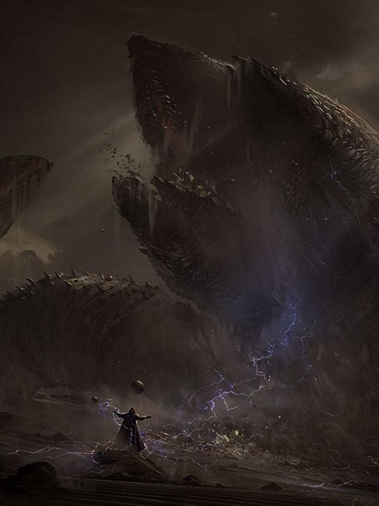 En mand står foran et stort monster Wallpaper