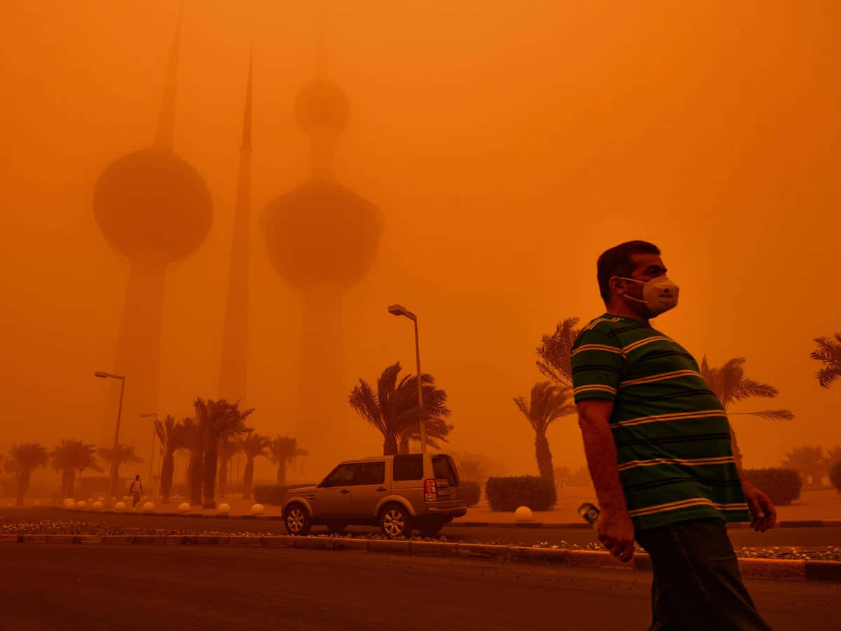 Dust_ Storm_ Cityscape_with_ Pedestrian Wallpaper