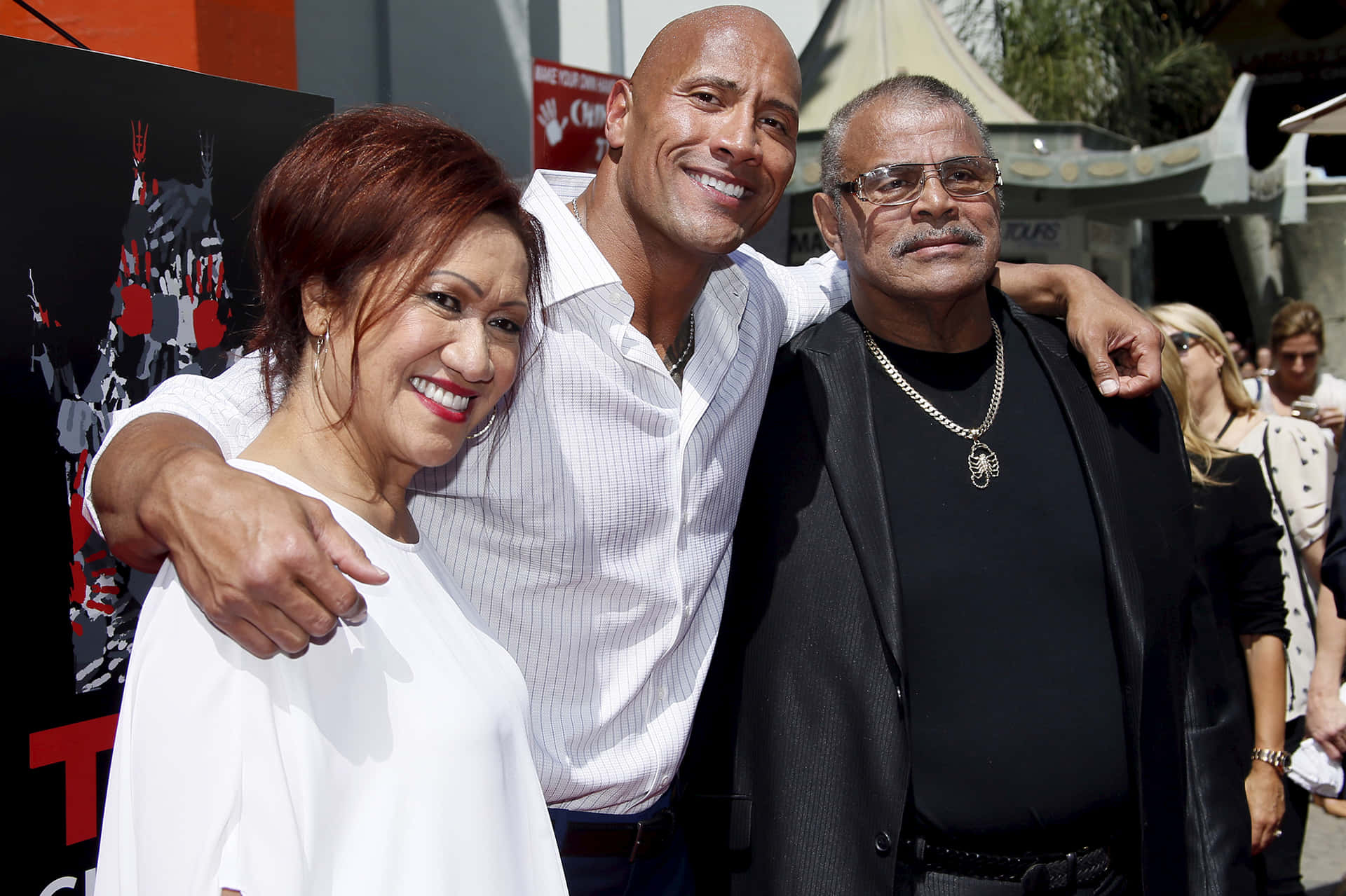 Dwayne Johnson With Ata And Rocky Johnson May 2015 Background