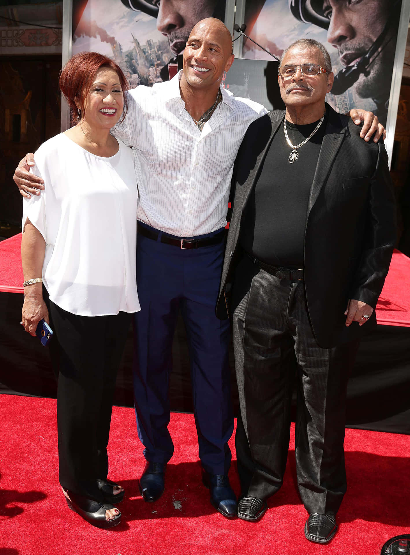 Dwayne Johnson With Parents Ata And Rocky Johnson Background