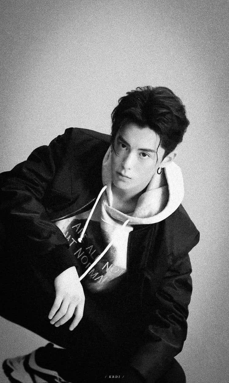 Download Dylan Wang Hand In His Neck Wallpaper