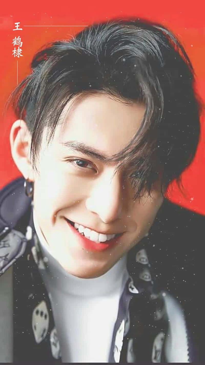 Dylan Wang In A Red Background Wallpaper