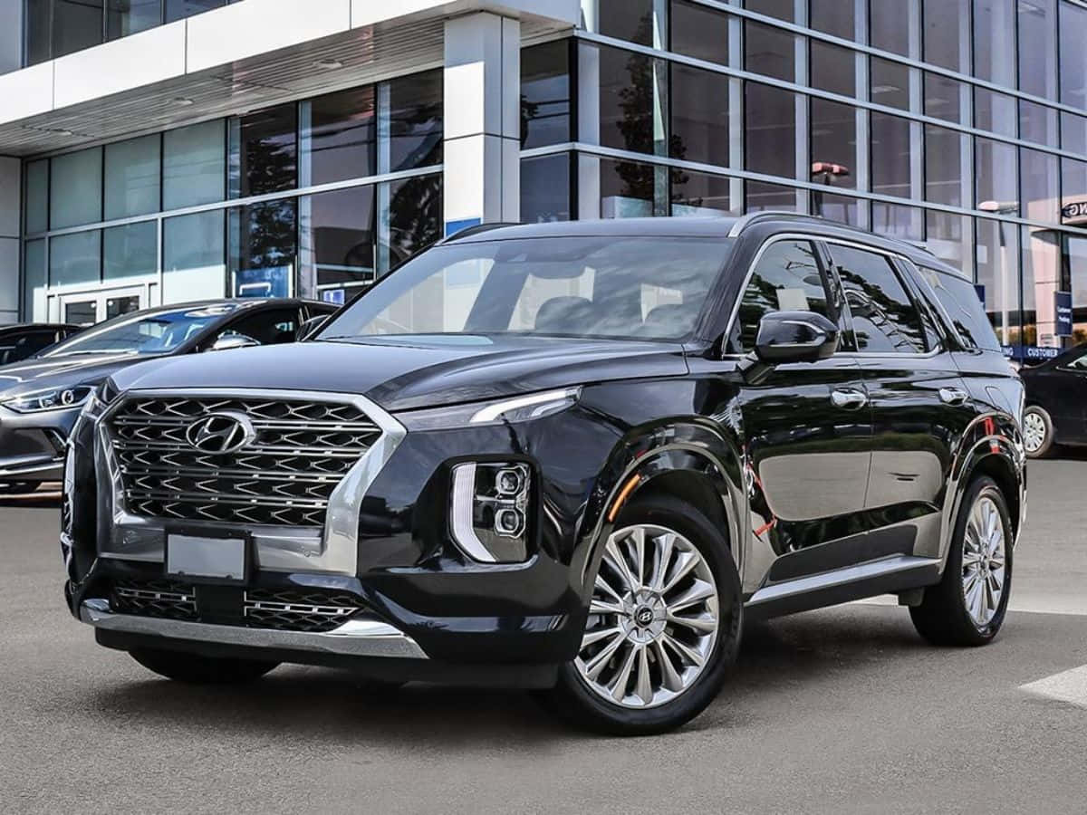 Dynamic And Elegant Hyundai Palisade In Motion Wallpaper