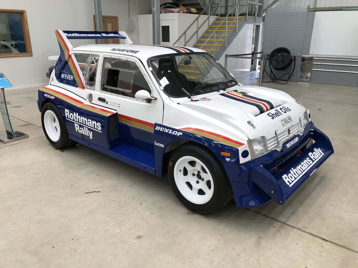 Dynamic Display Of The Mg Metro 6r4 Rally Car Wallpaper