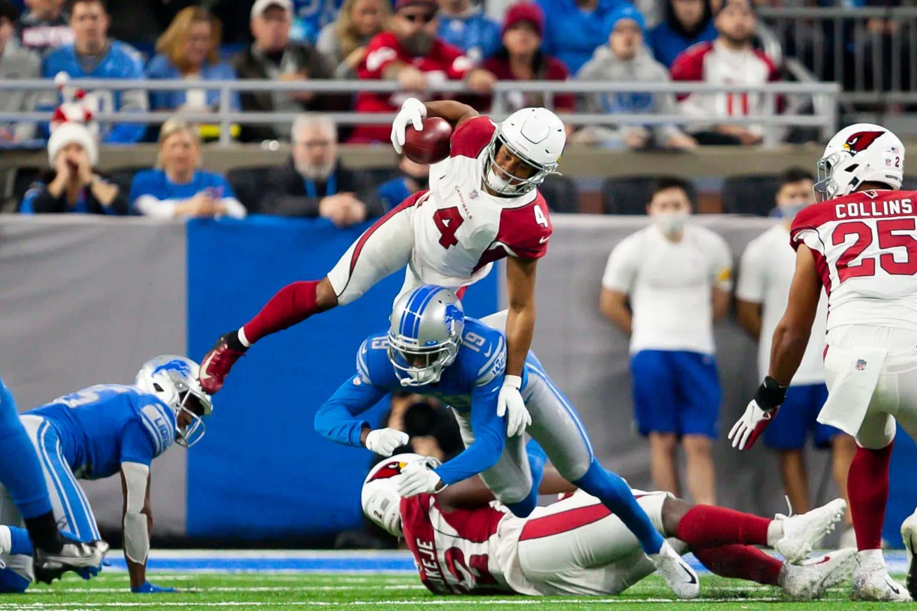 Dynamic Football Catch Midair Wallpaper