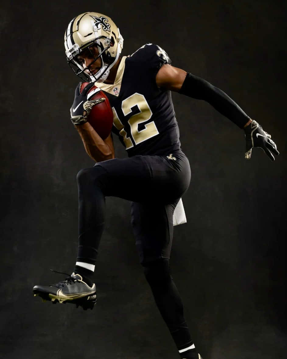 Dynamic Football Player Action Pose Wallpaper