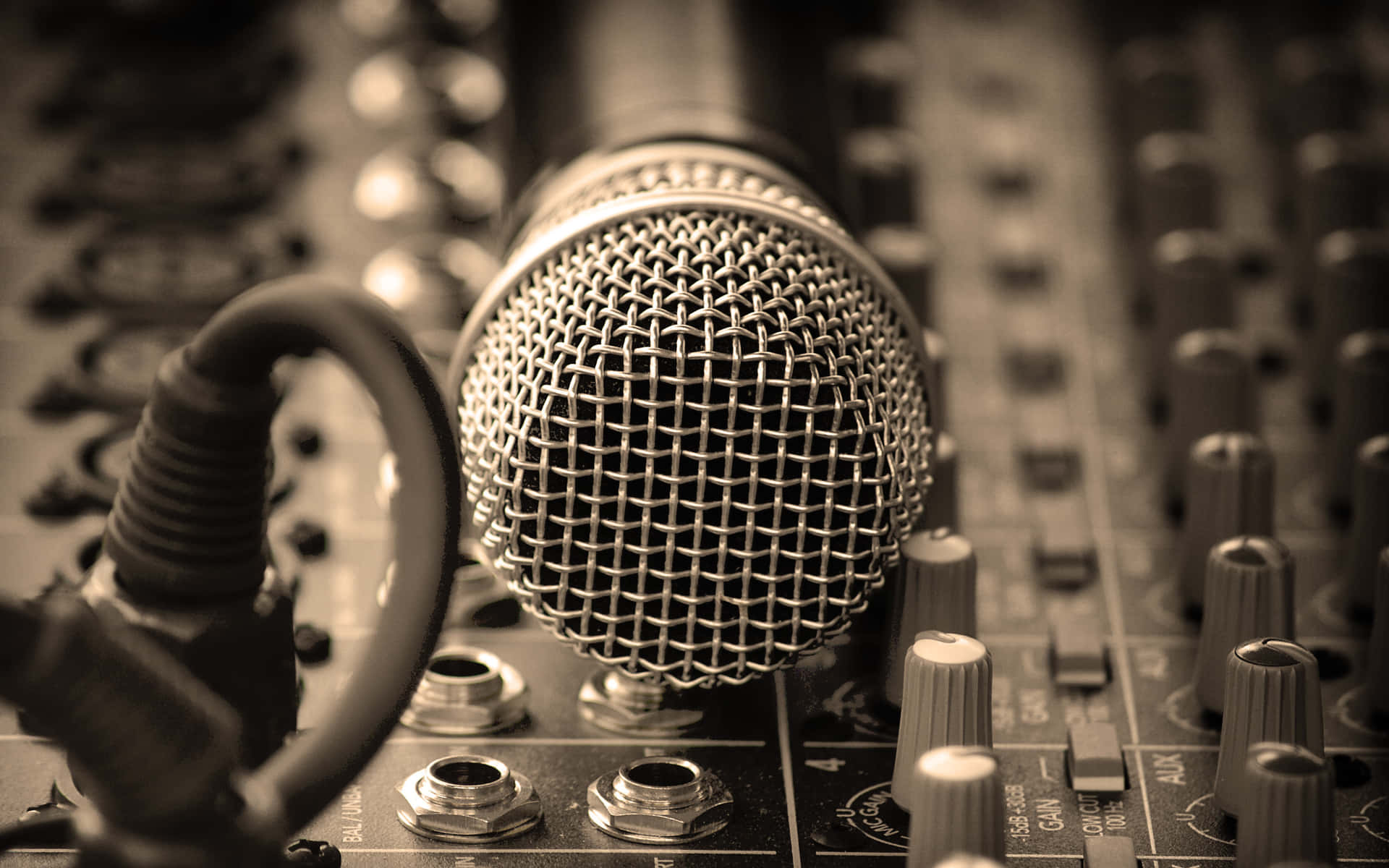 Dynamic Microphone On A Mixing Console Wallpaper