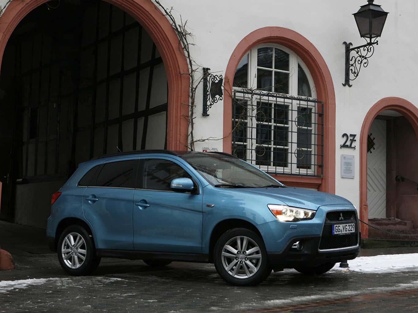 Dynamic Mitsubishi Asx On The Open Road Wallpaper