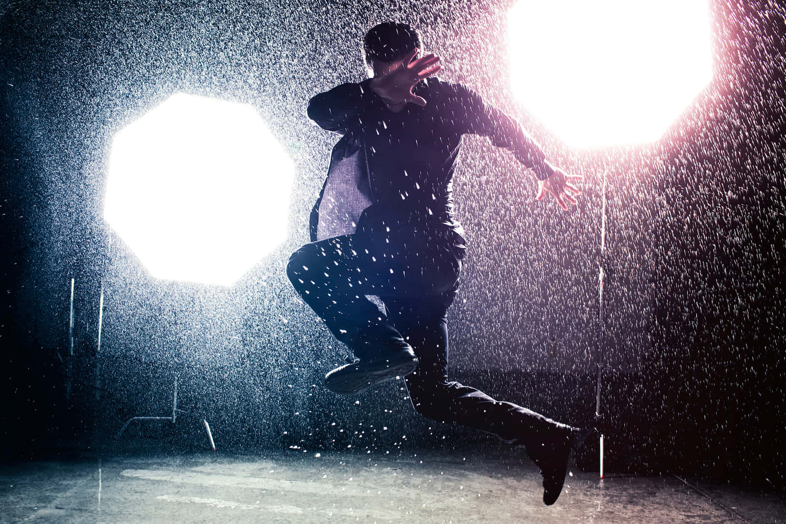 Dynamic Rain Dance Performance Wallpaper