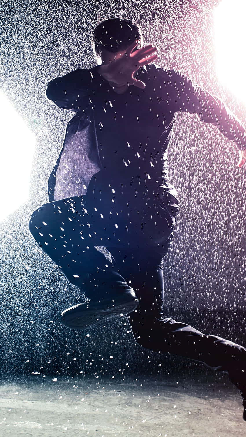 Dynamic Rain Dance Silhouette Wallpaper