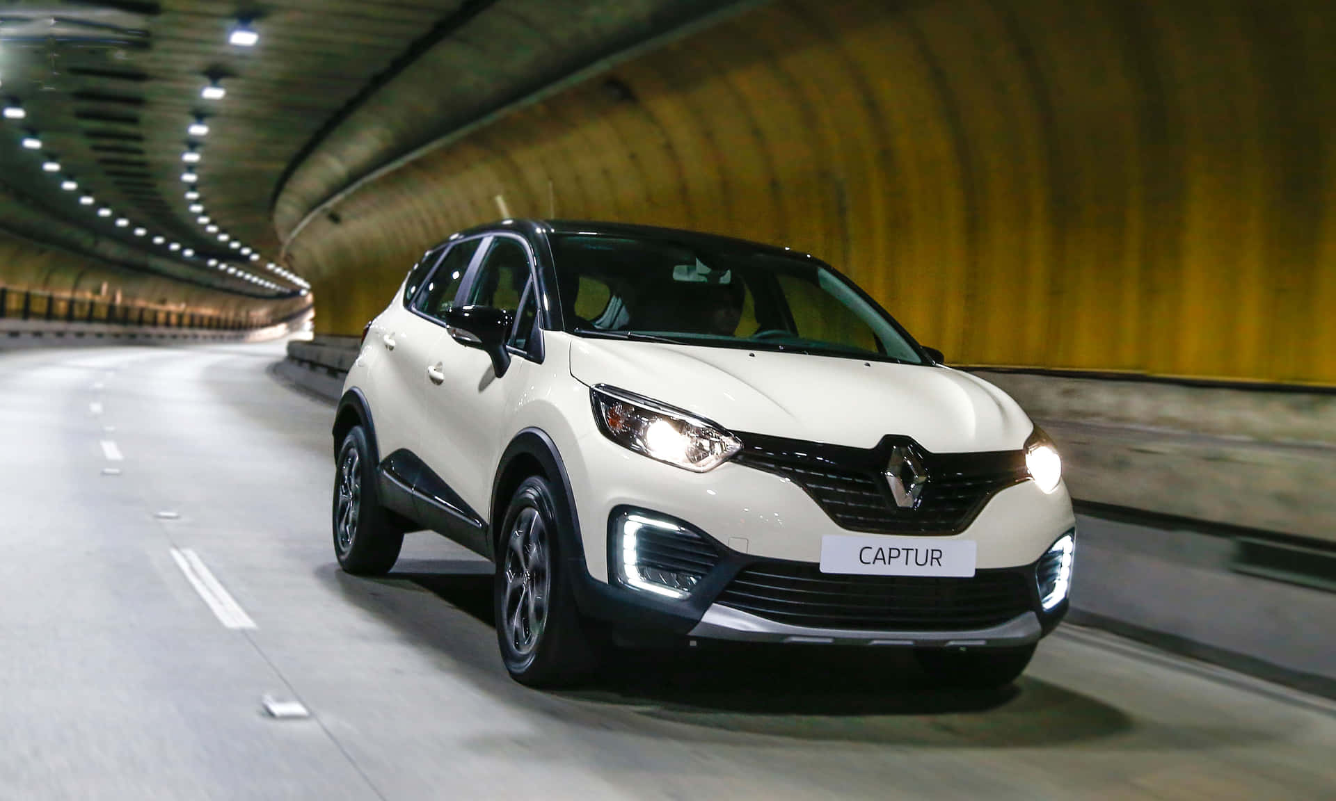 Dynamic Renault Captur Cruising The City Streets Wallpaper