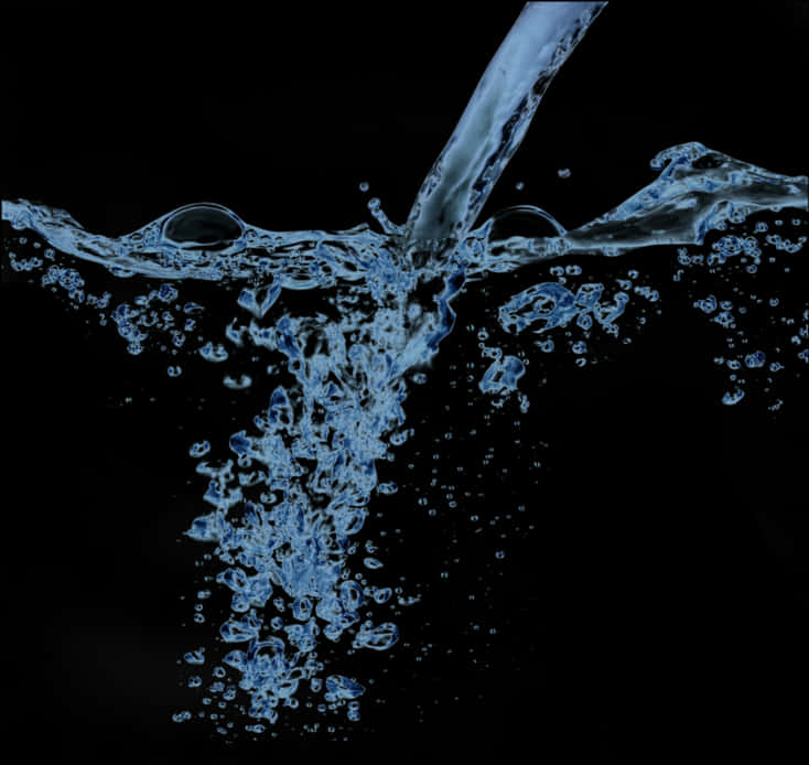 Dynamic Water Splash Against Black Background.jpg PNG