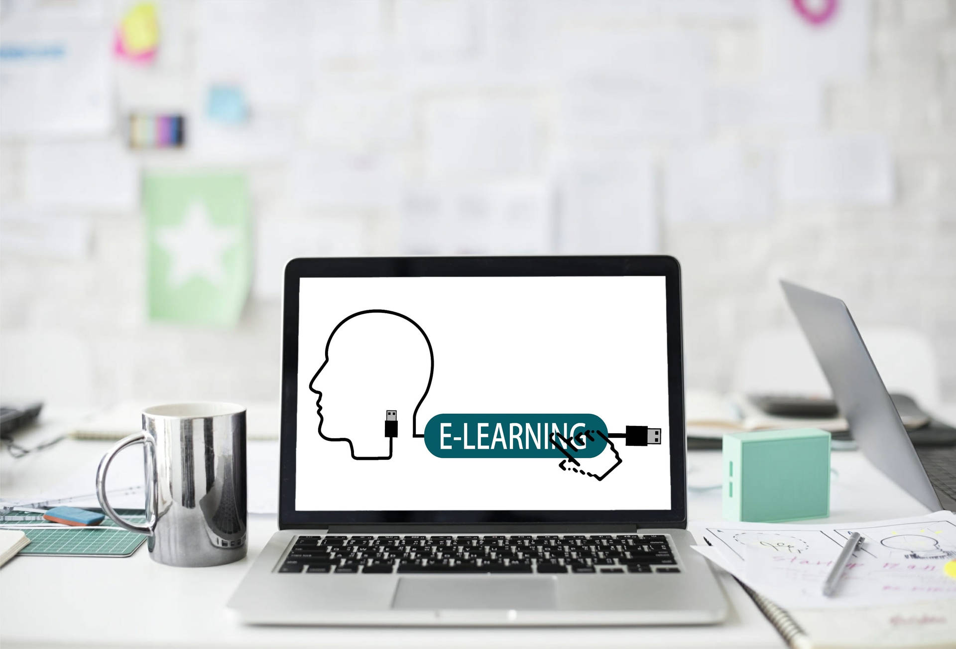 E-learning Graphics On Laptop Background