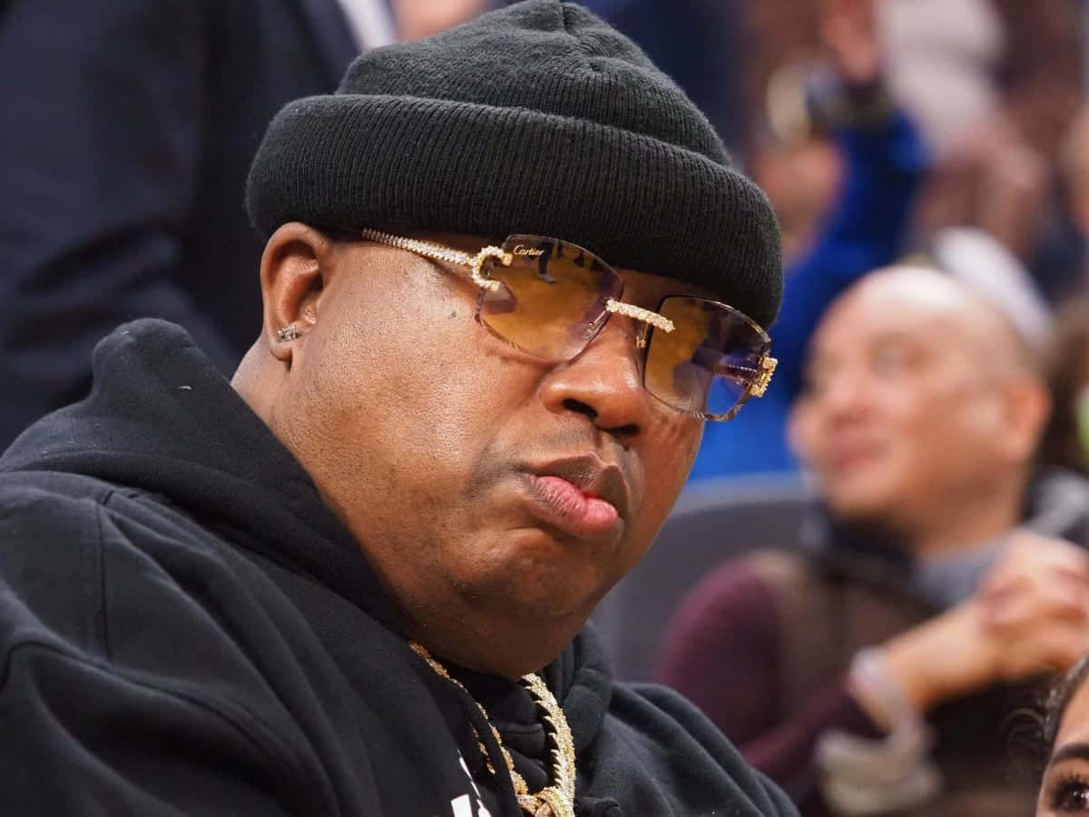 E40 Wearing Golden Glasses Wallpaper