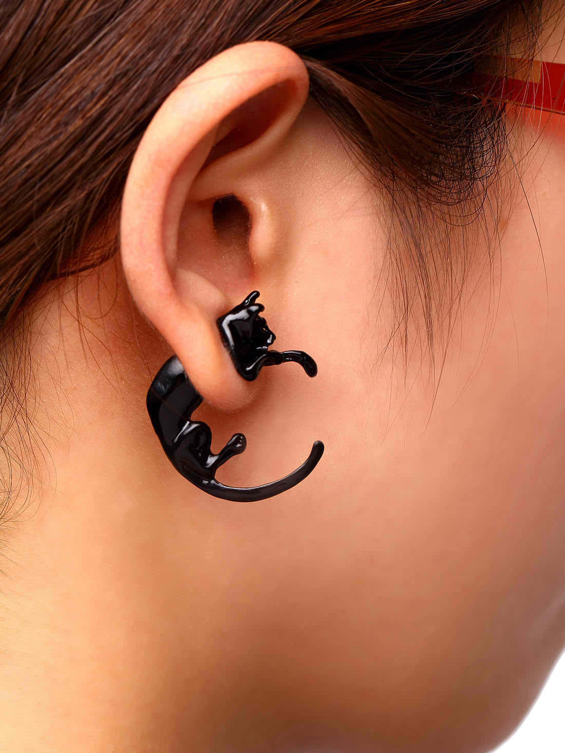 A Woman Wearing A Black Cat Ear Cuff