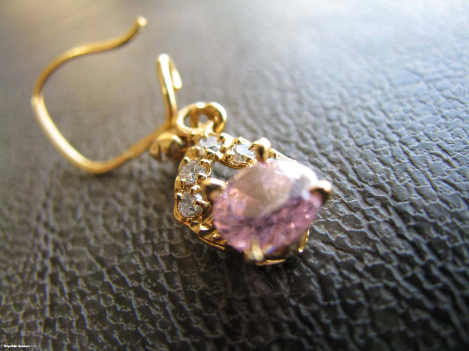 A Pink Sapphire And Diamond Dangle Earrings