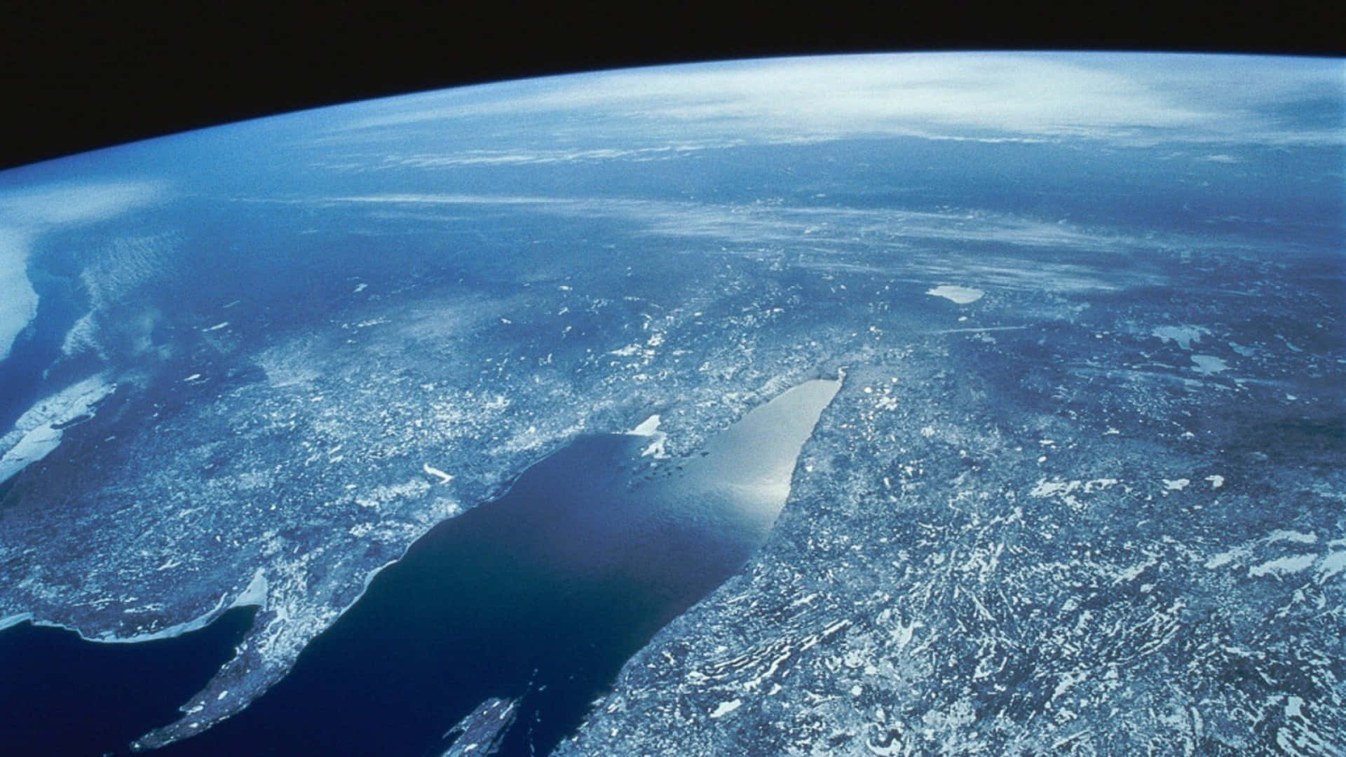Vistade La Tierra Desde El Espacio Exterior Fondo de pantalla