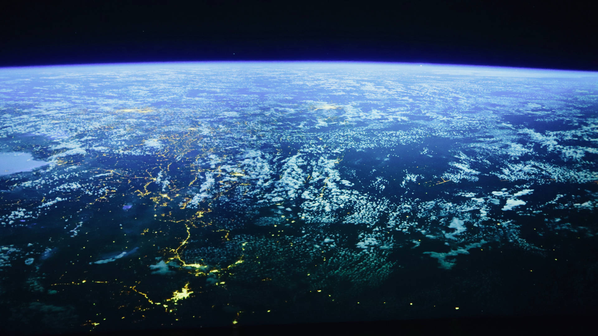 Vistaespacial De La Tierra: Una Civilización Más Allá De La Tierra Fondo de pantalla