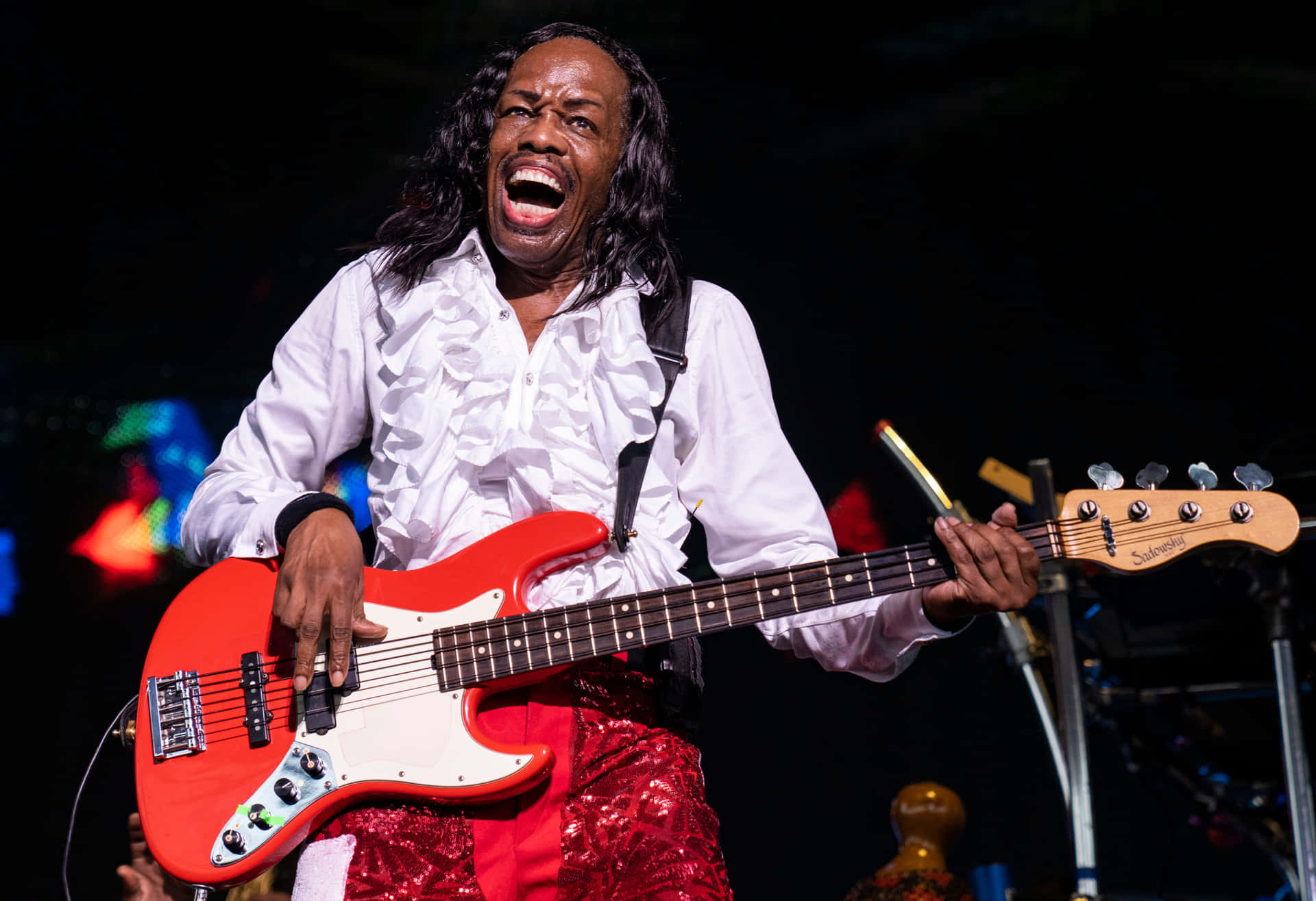 Earth, Wind&Fire In Vibrant Concert Energy Wallpaper
