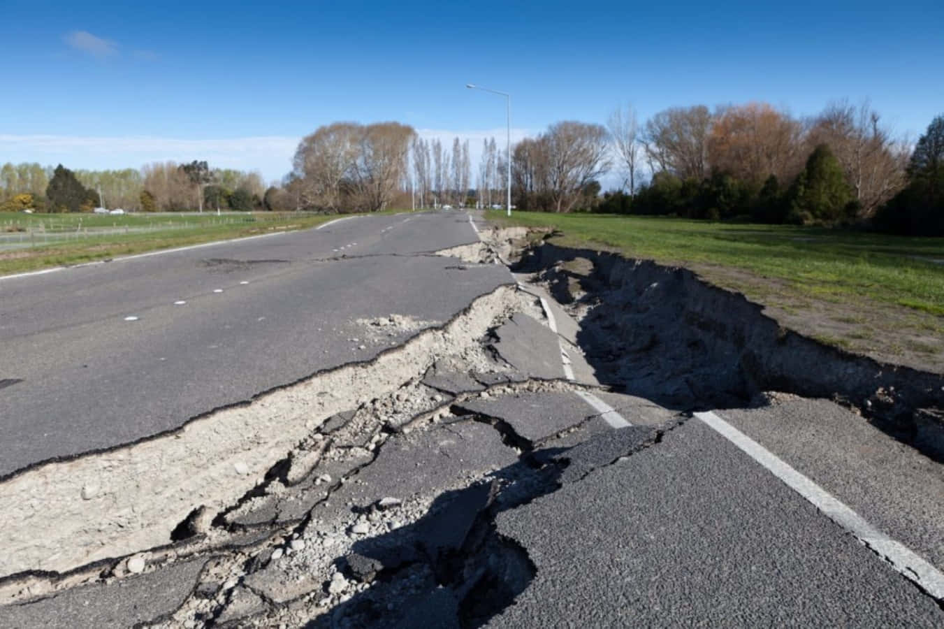 A Road With A Large Crack In It