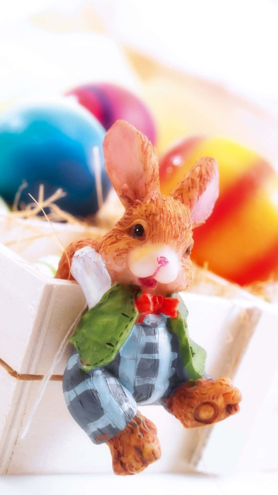 Conejode Pascua En Una Caja Con Huevos De Pascua Fondo de pantalla