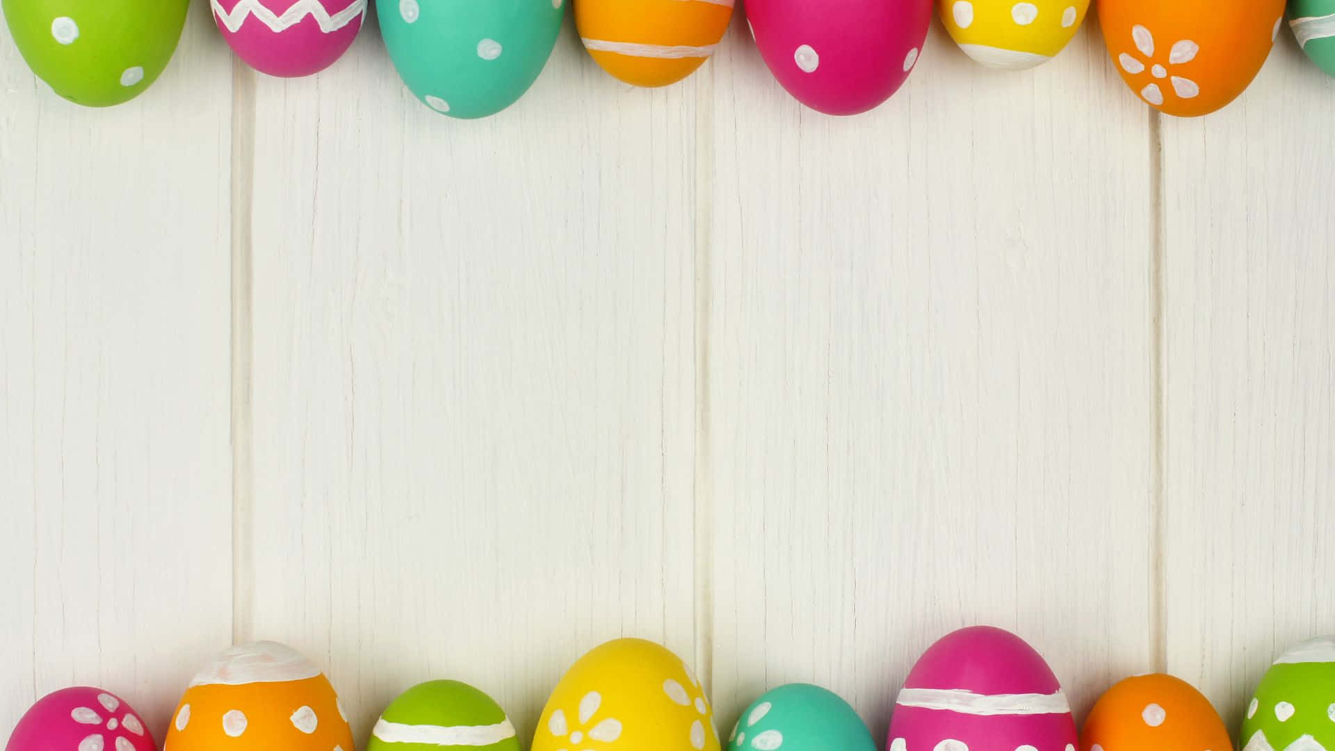 White Wall With Colorful Easter Eggs Background