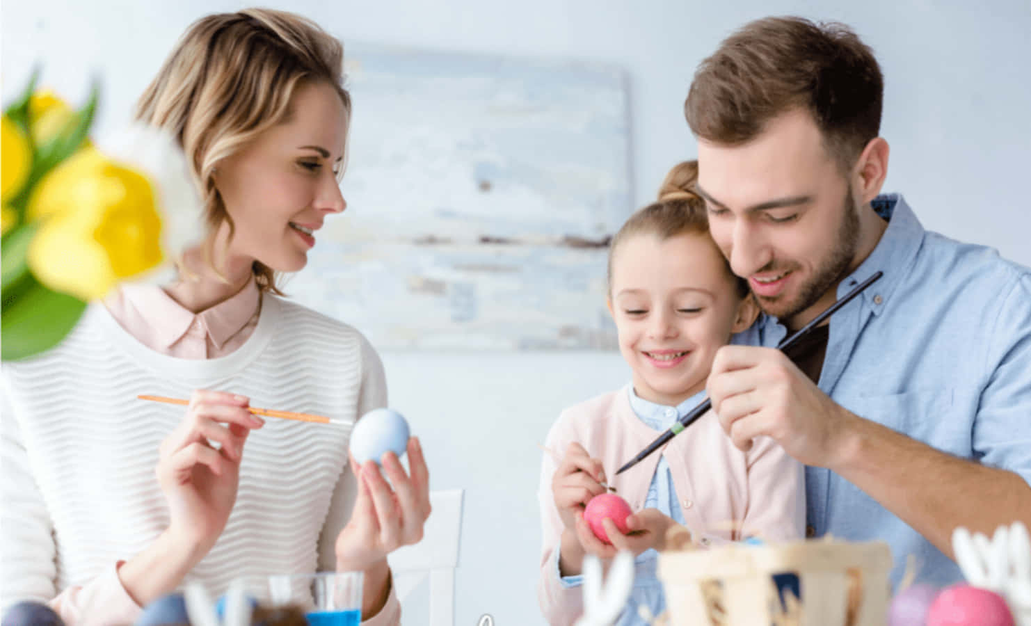 Family Painting Easter Eggs Picture