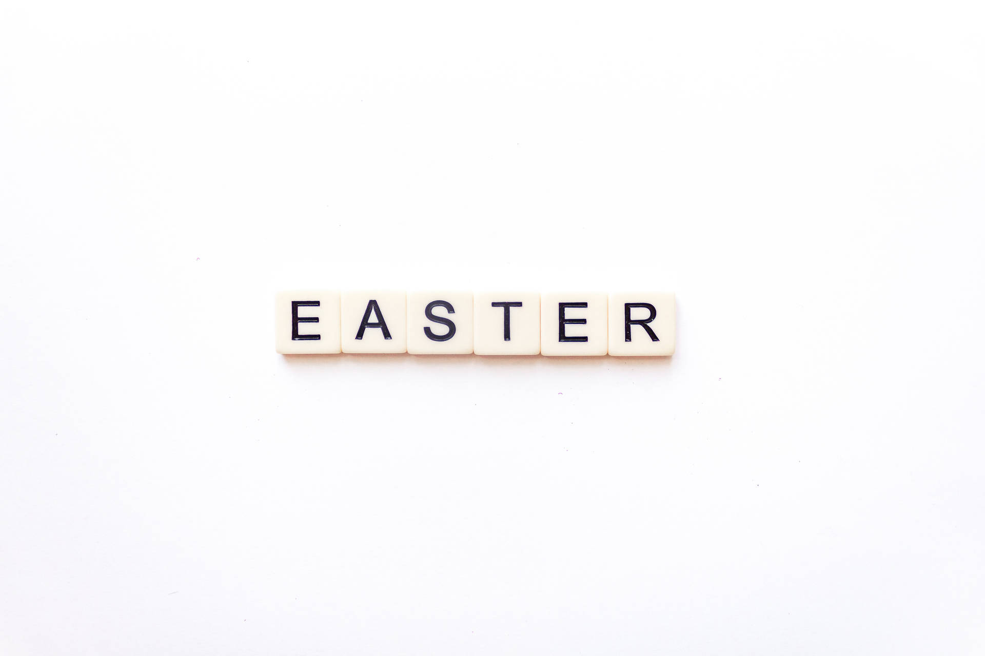 Spell out your Easter wishes with this Easter-themed Scrabble board! Wallpaper