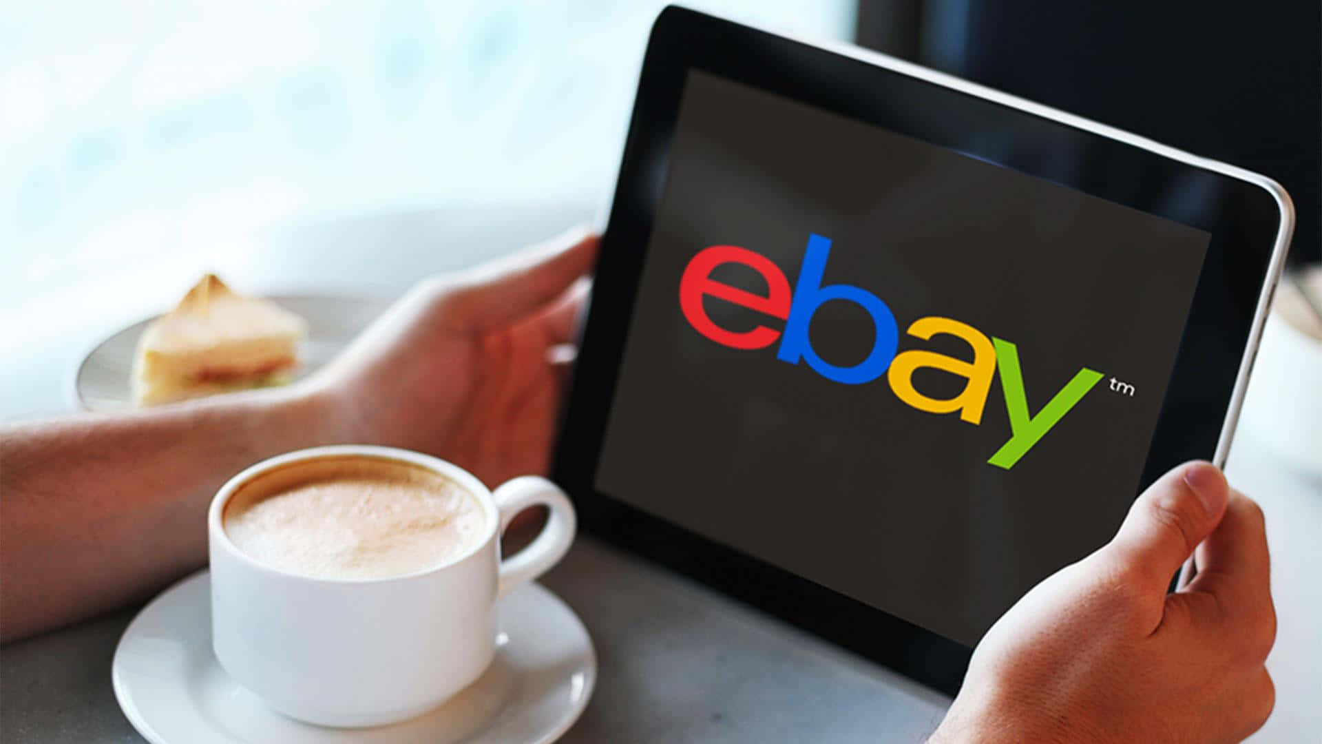 eBay UK Logo On Tablet Wallpaper