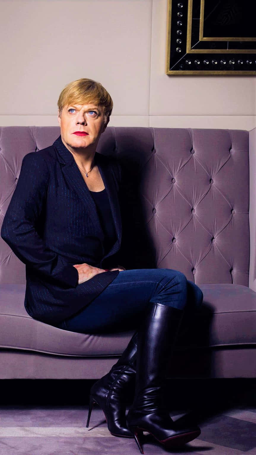 Eddie Izzard performing on stage Wallpaper